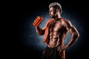 bodybuilder drinking water